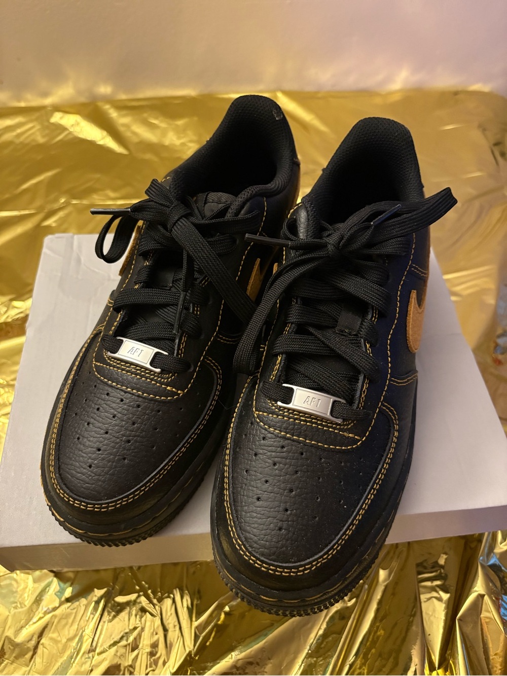 Nike Air Force One Sneakers with Gold Accent Details